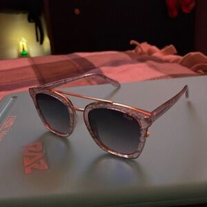 Quay never been used sunglasses other than being tried on! Grey Snakeskin print